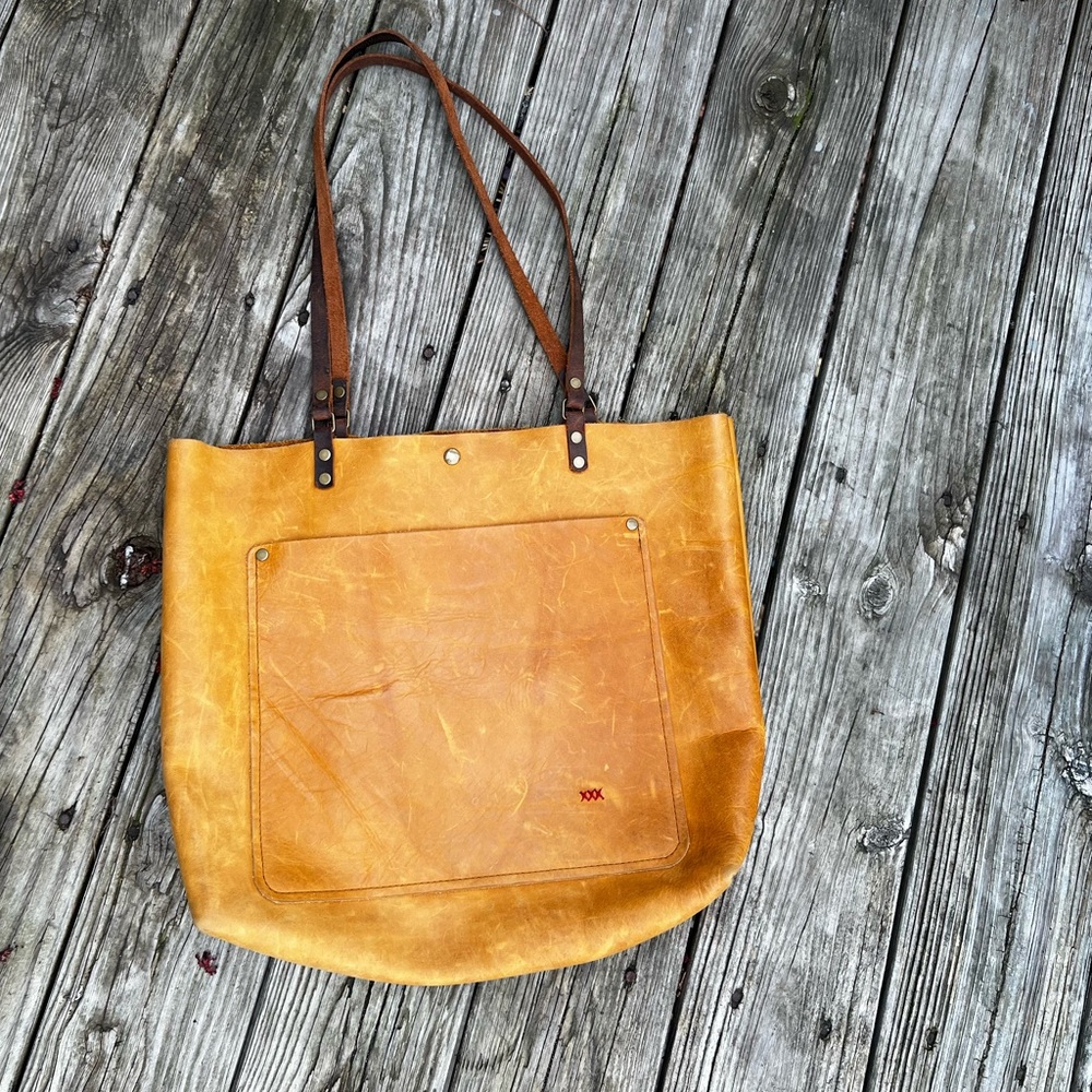 In blue Tan Leather Tote Bag